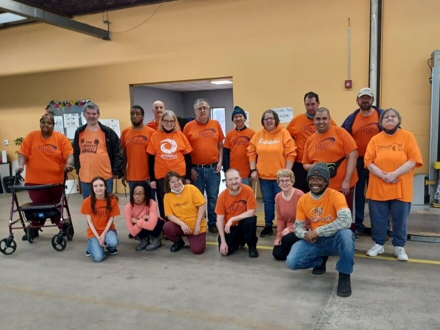 Weaver Industries team Weaver Industries team members in matching shirts